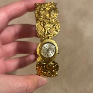Gold Women's Watch with zodiac Design